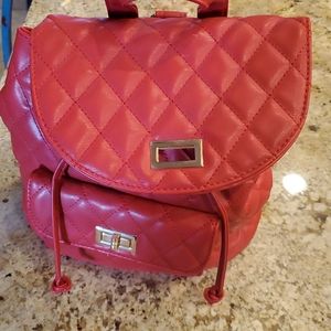 Red quilted backpack